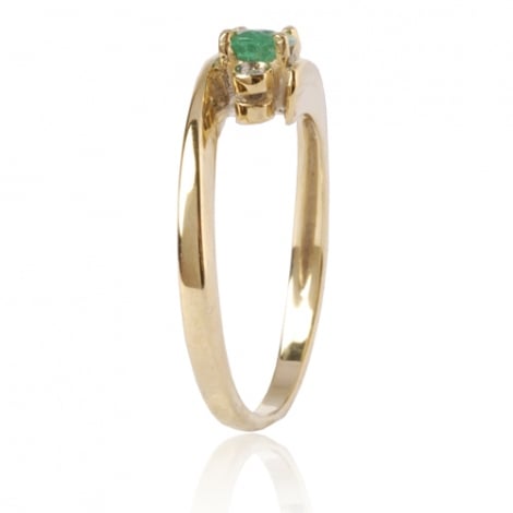 Bague Emeraude 0.40 ct sertie de deux diamants 0.04 ct
