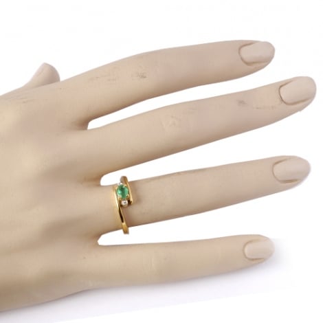 Bague Emeraude 0.40 ct sertie de deux diamants 0.04 ct