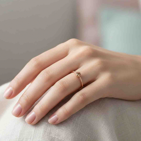 Bague solitaire en or rose et diamant marron