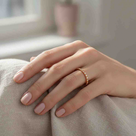 Demi-alliance en or rose et diamants