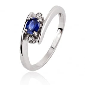 Bague saphir bleu 0.50 ct sertie de diamants 0.04 ct
