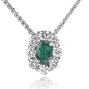 Collier Emeraude ovale 0.50 ct serti de 0.52 ct de diamants