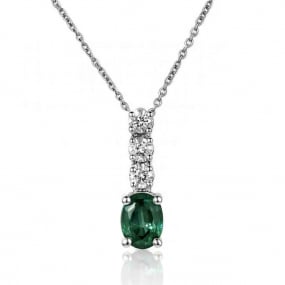 Collier émeraude ovale serti de diamants